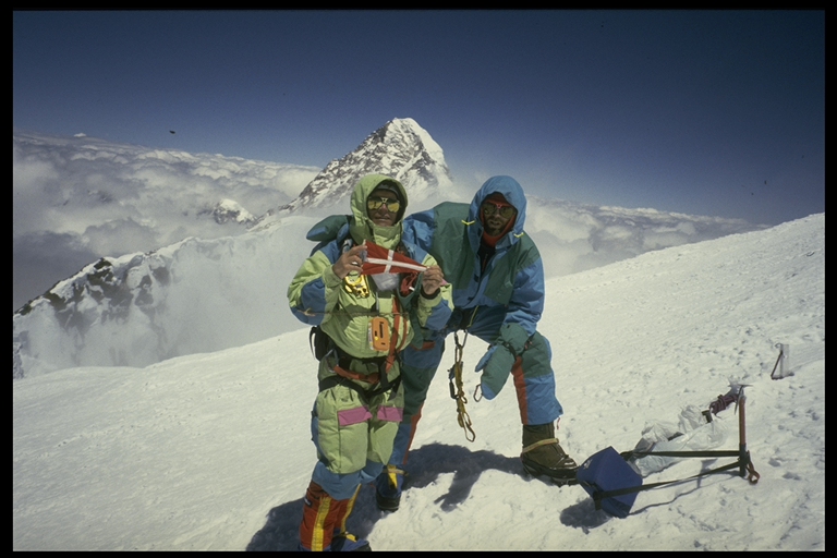 Bo Belvedere and Jan Mathorne on the summit of Broad Peak with K2 in the background